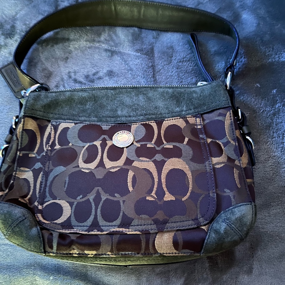 11in by 8 in green suede and gold Coach bag. Never used in perfect condition